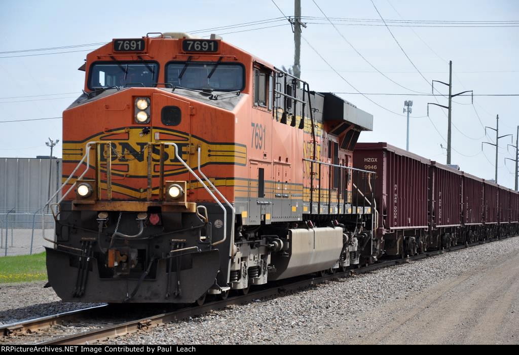 Empty ballast train heads west